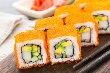 Sushi roll with tobico and avocado