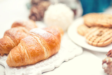 Delicious and tasty fresh croissants as breakfast meal