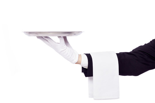 Waiter holding an empty silver tray over white background
