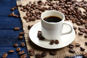 Cup of coffee on wooden table