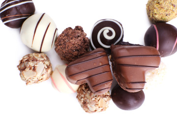 Group of sweet chocolate candies isolated on white background