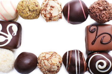Group of sweet chocolate candies isolated on white background