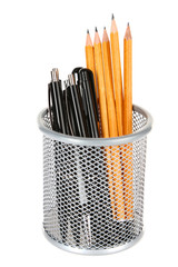 Pens and sharp pencils in metal vase isolated