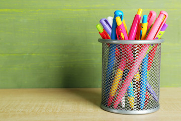 Metal holder with different pens