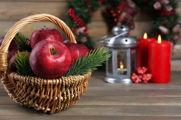 Christmas apples on wooden table