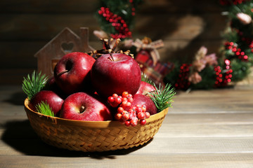 Christmas apples on wooden table