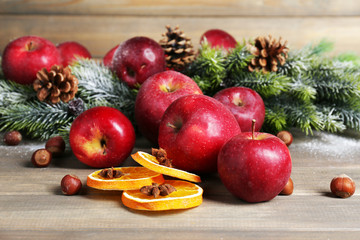 Christmas apples on wooden table