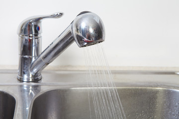 Kitchen Water tap and sink.