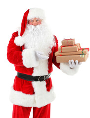 Santa Claus holding gift boxes isolated on white background