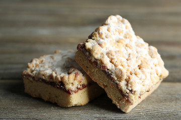 Tasty homemade pie on wooden table