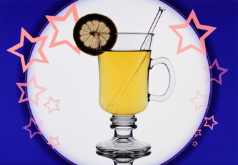 Yellow mulled wine on blue background with stars