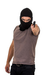 male thief wearing mask and holding gun isolated