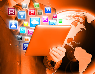 Business man use tablet pc with colorful application icons