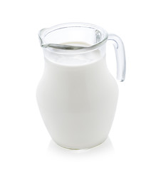 Glass jug of fresh milk isolated on white