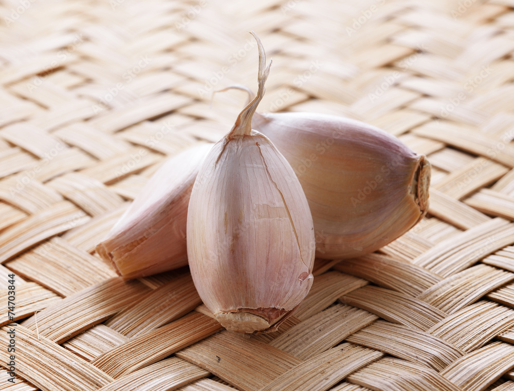 Canvas Prints garlic whole and cloves on the wooden background