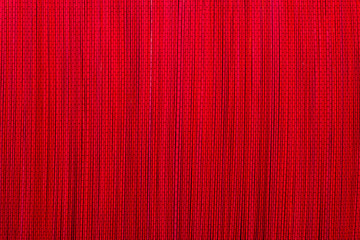 Red bamboo mat texture or background