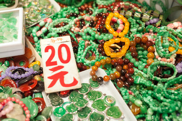 Fototapeta premium Jade jewelery at the Yaumatei jade market, Hong Kong