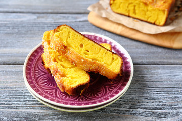 Tasty slices tea cake with lemon on a plate