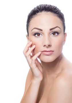 Beautiful face of young adult woman with clean fresh skin