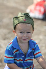 Portrait of a boy in garrison cap