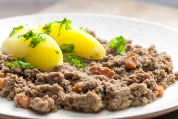 hash meat with bacon and potatoes