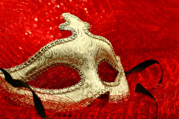 Vintage carnival mask in red background