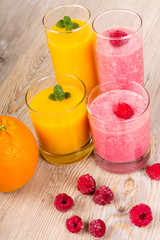 Fresh orange and raspberry smoothie drinks
