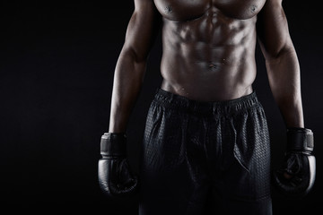 Fototapeta na wymiar Torso of young african male boxer