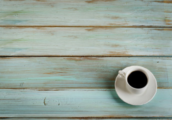 Coffee   on a  blue  wooden background