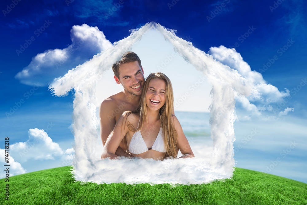 Aufkleber Composite image of athletic couple smiling at camera and hugging