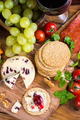 top view on oatcake with stilton cheese and cranberry