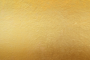 Gold cement wall texture background