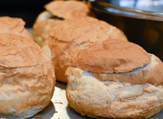 Christmas market food - close up of bread bowls
