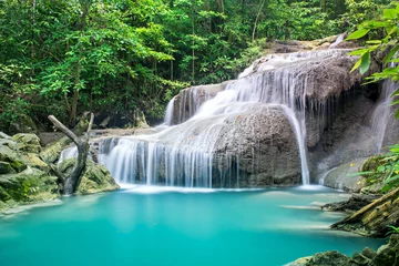 Fototapeten Beautiful waterfall in deep forest © totojang1977
