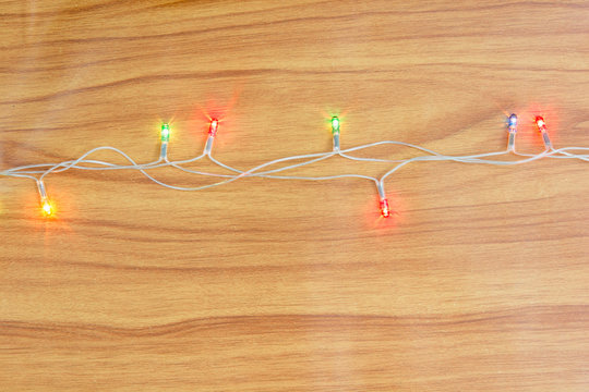 christmas light decorations on wooden