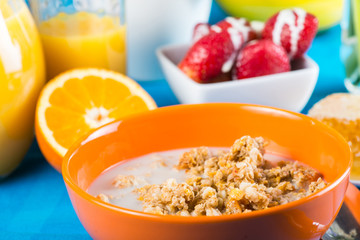 Muesli with fresh fruits and orange juice
