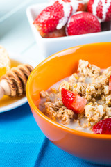 Cereal with fresh fruit and honey