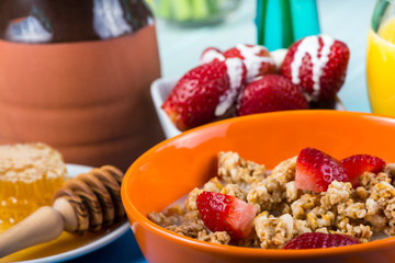 Cereal with fresh fruit and honey