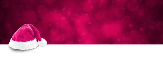 Weihnachten Deko mit Weihnachtsmann Mütze und Sterne Hintergrund pink