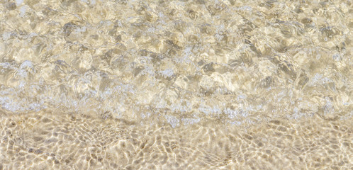 pattern of water at the sandy beach