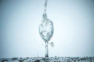 glass being filled with water