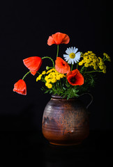 Still life with poppies