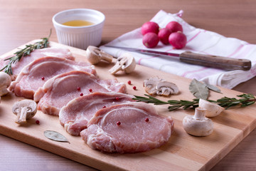 Pork tenderloin with champignon, rosemary, bay leaves and pepper