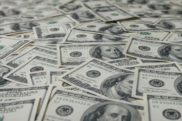 american dollars pile as background