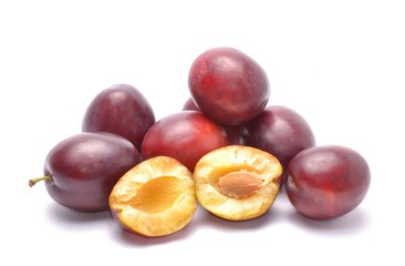 Plums isolated on white background