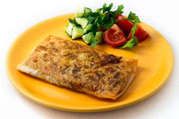 the pancakes with meat and garnish on the white background