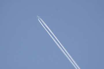 airplane in the blue sky