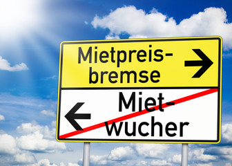 Wegweiser mit Mietpreisbremse und Mietwucher