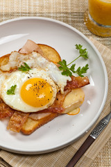 French breakfast toast with fried eggs. Selective focus.