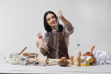 Woman cooking cookies or pie or cake